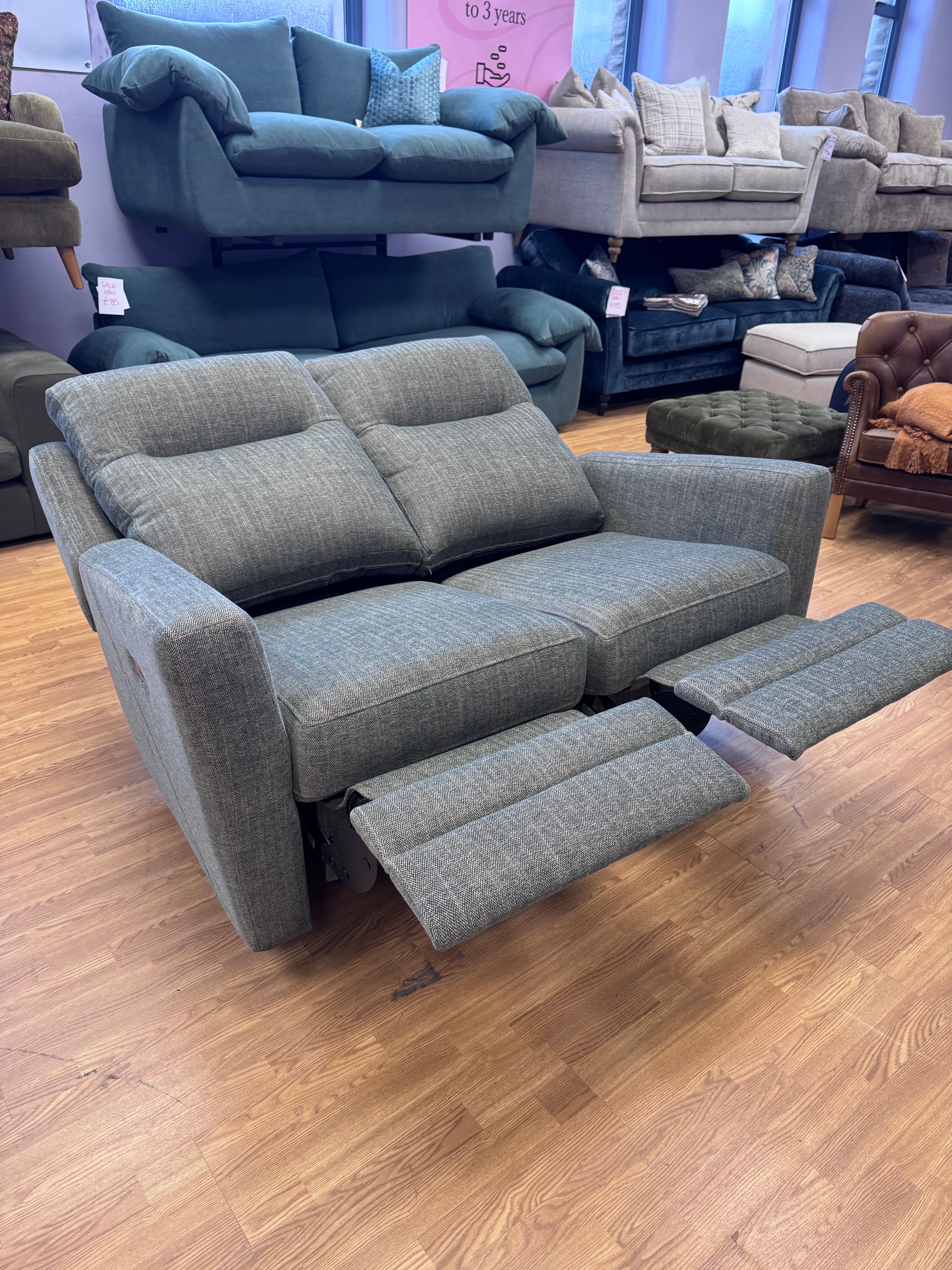 Parker Knoll Chicago split 2 seater electric reclining sofa with lumbar support in Green herringbone fabric