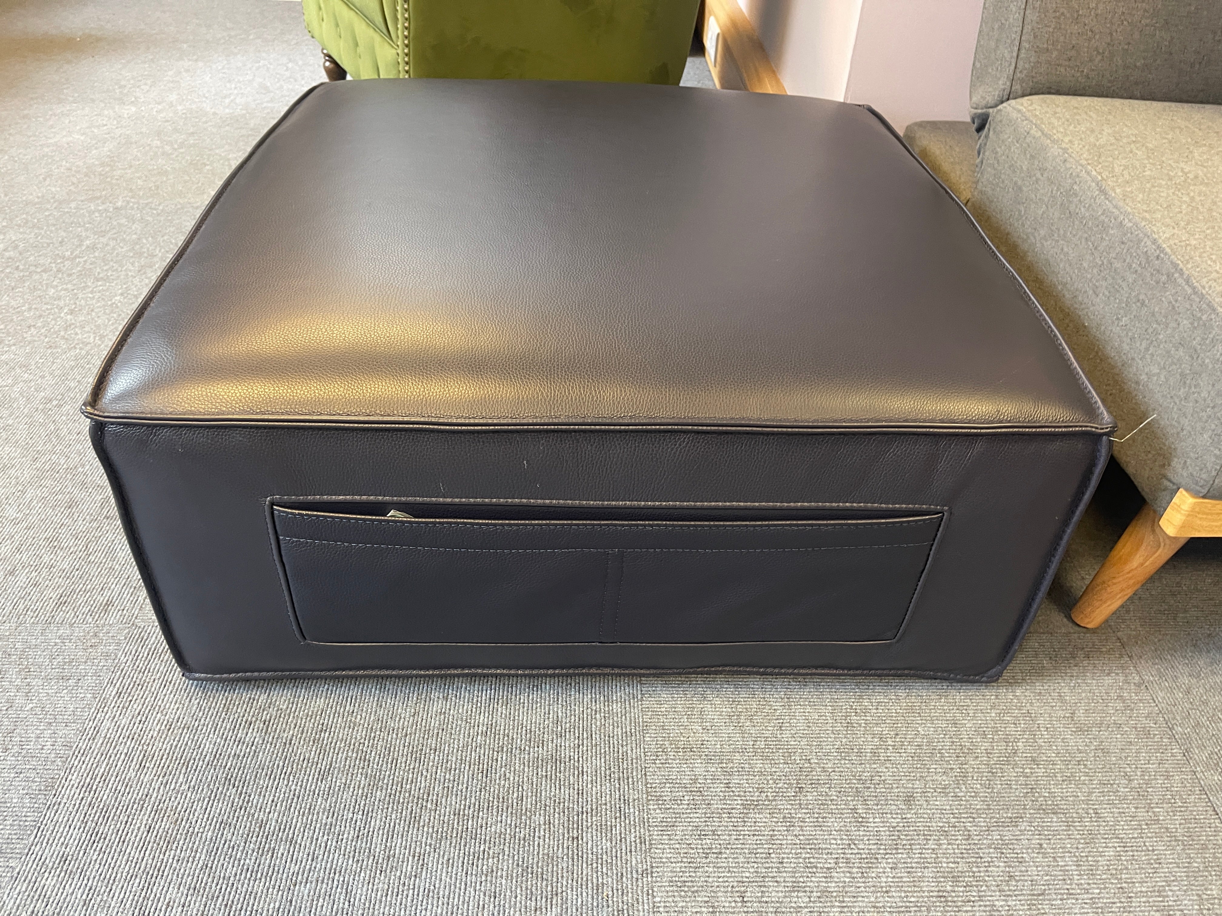 SAMPLE low square shape footstool with side storage in navy blue leather