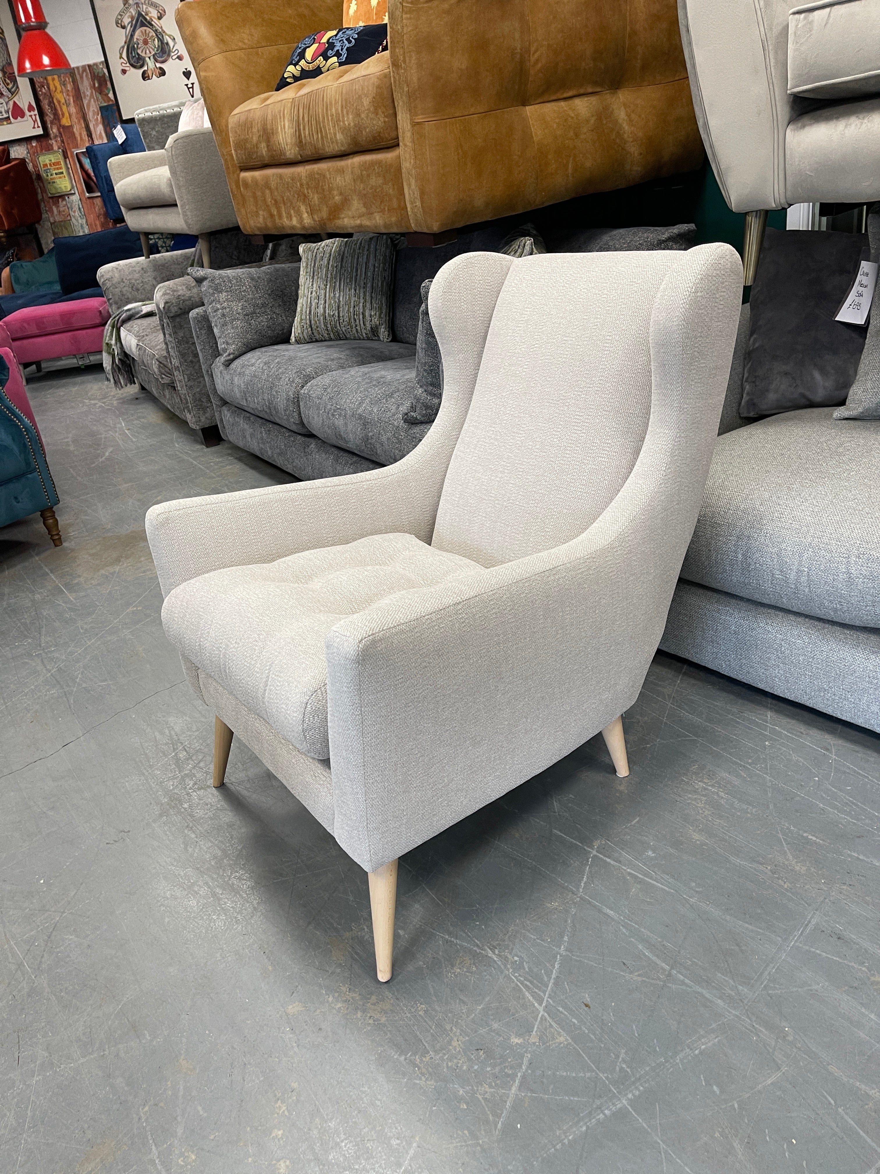 Grand Designs Padstow wingback armchair in light natural cross weave fabric